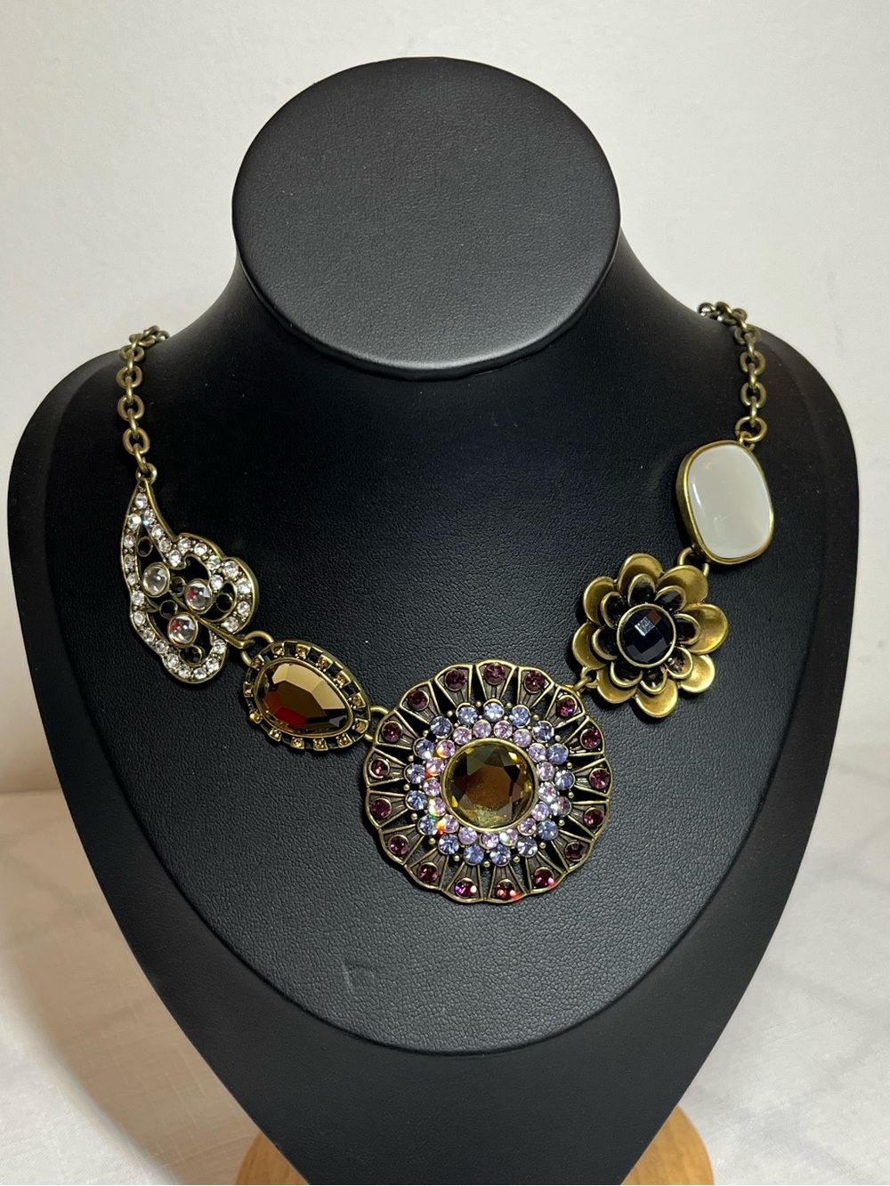 Statement Floral & Medallion Necklace in Gold with Amber and White Accents
Bold